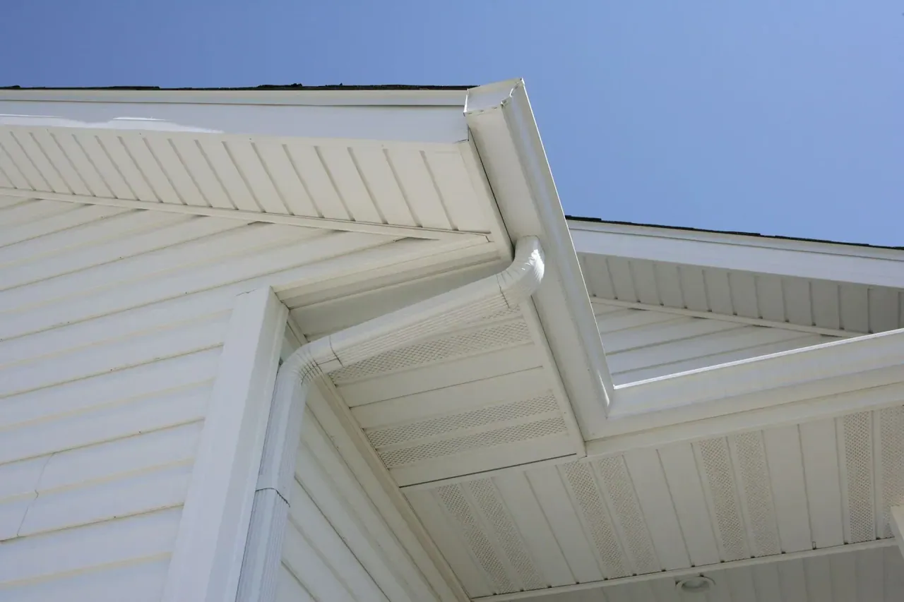 Galvanized half-round gutter and downspout on a tiled-roof home in Glassboro, NJ