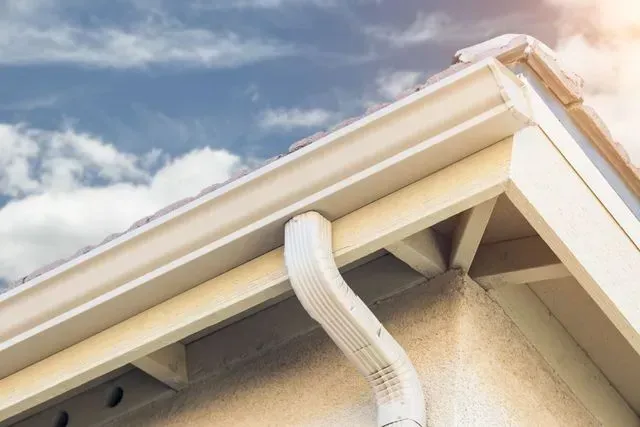 Seamless aluminum gutter and downspout on a South Jersey stucco home